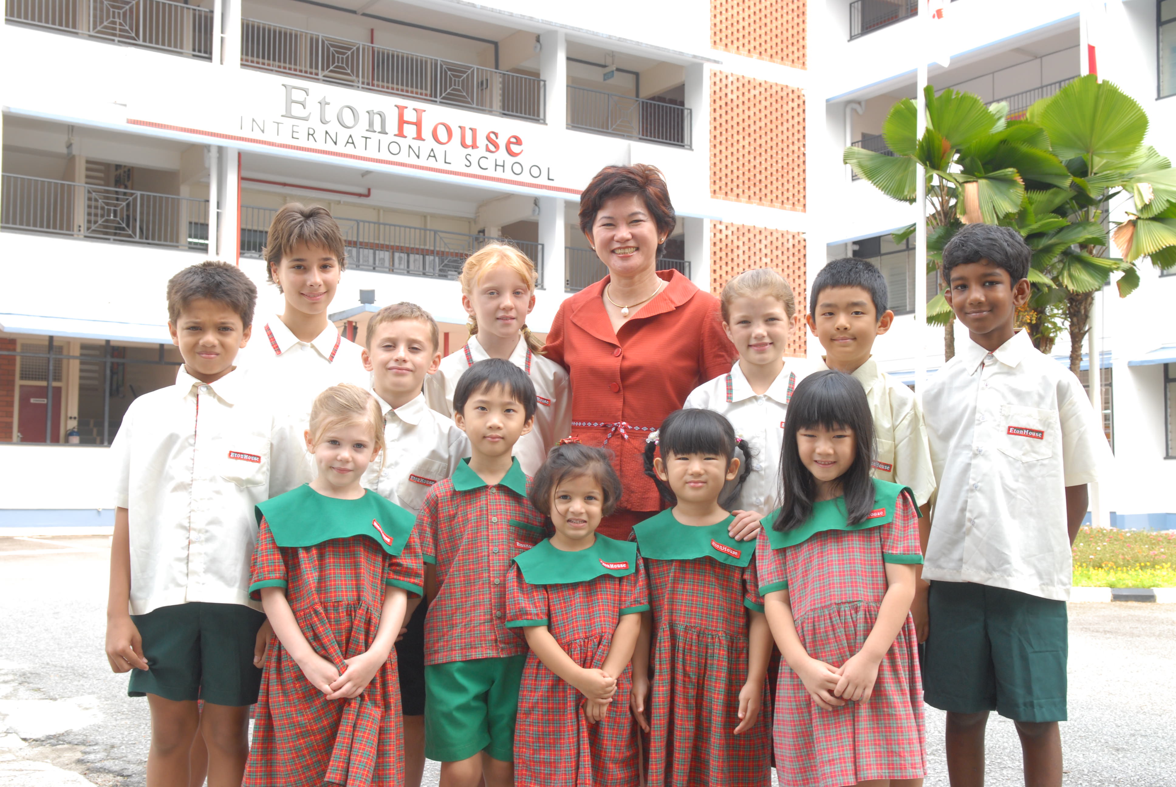 Mrs. Ng Gim Choo with EtonHouse children